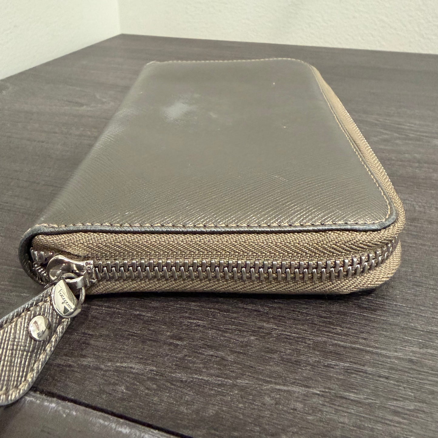 #016 SALVATORE FERRAGAMO Metallic Pewter Zip Wallet
