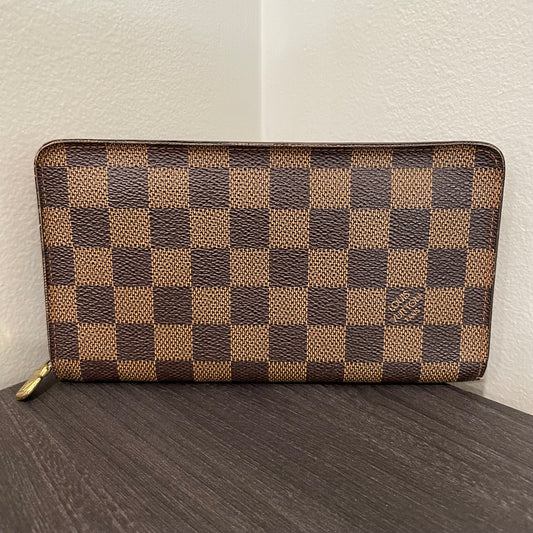 SOLD! Louis Vuitton Damier Ebene Zippy Wallet