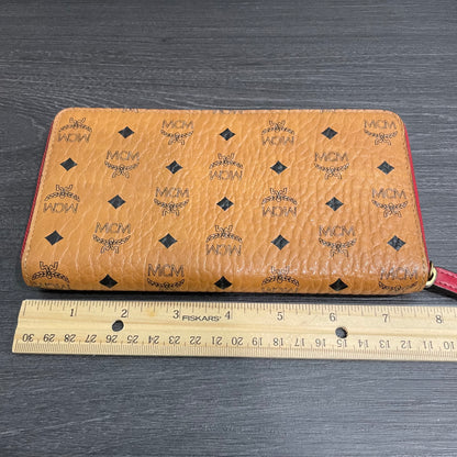 #115 MCM Leather Zippy Wallet