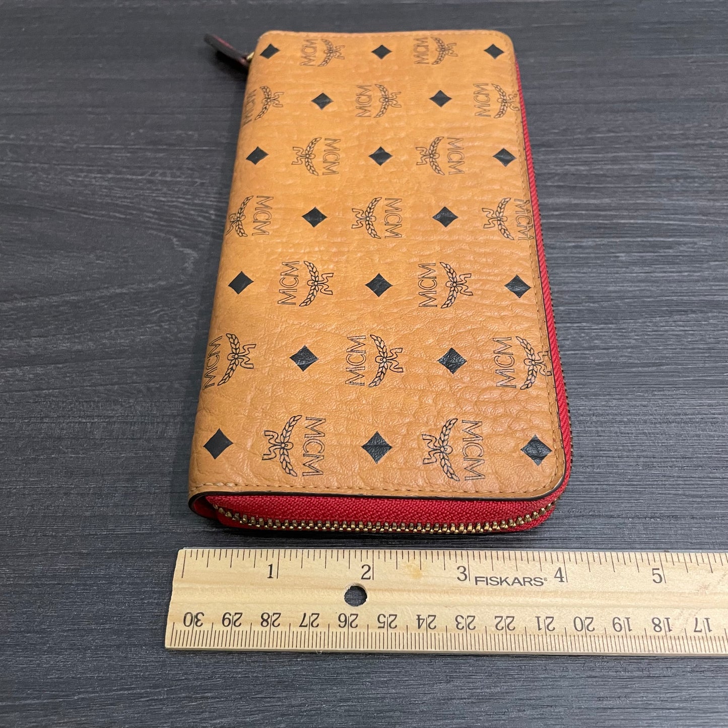 #115 MCM Leather Zippy Wallet