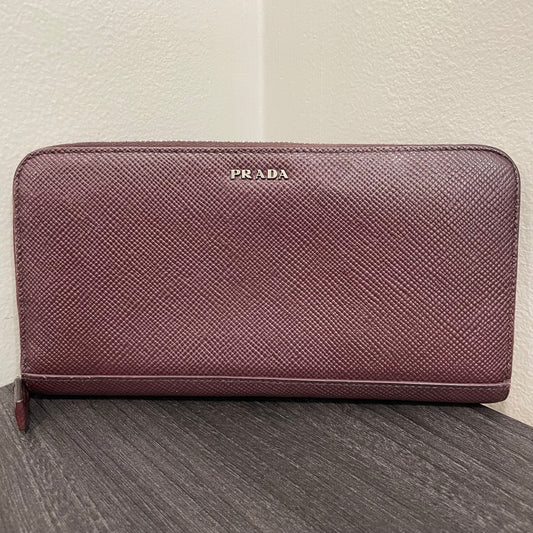 #128 PRADA Plum Leather Zippy Wallet