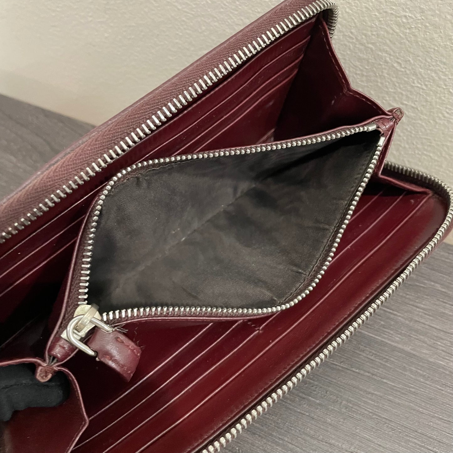 #128 PRADA Plum Leather Zippy Wallet