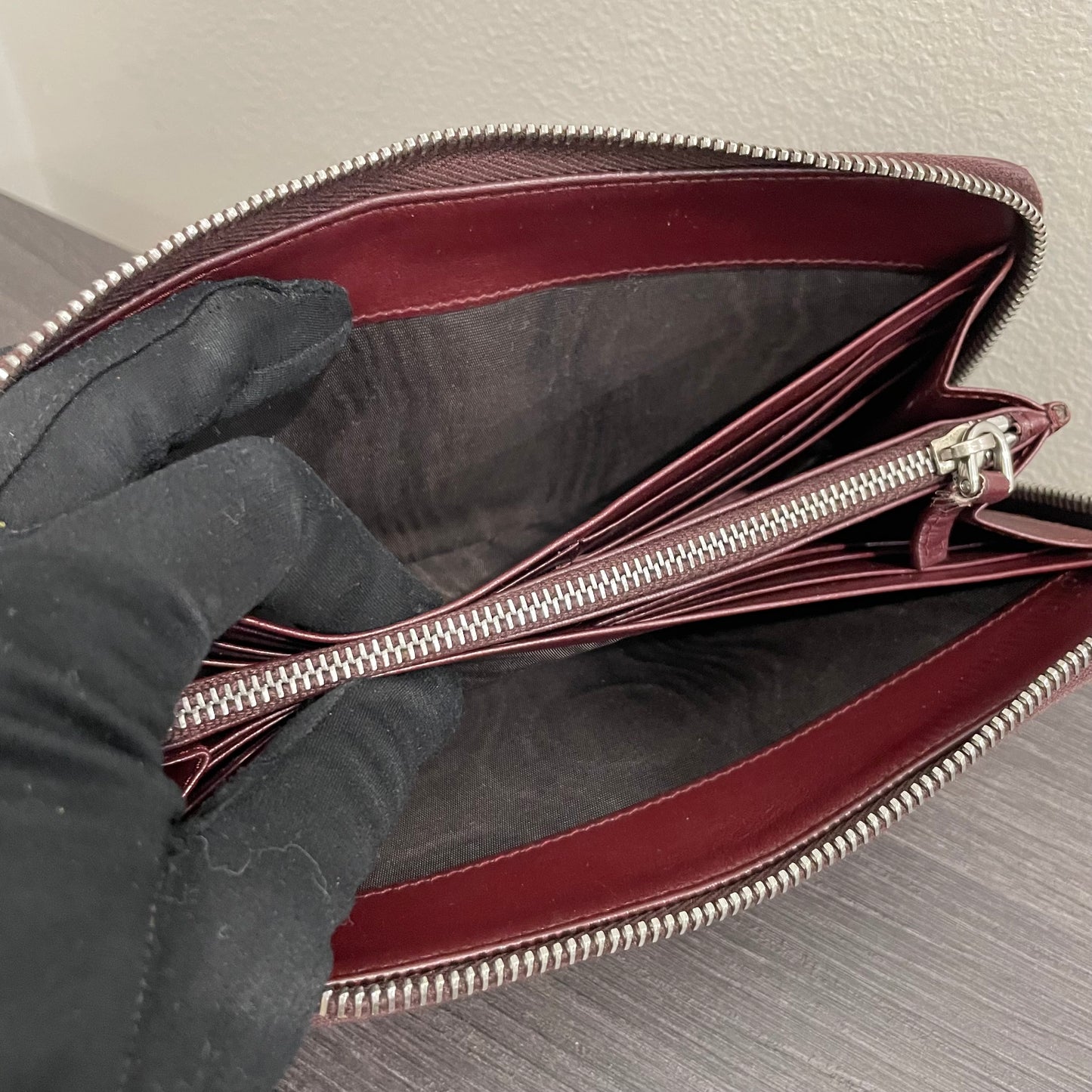 #128 PRADA Plum Leather Zippy Wallet