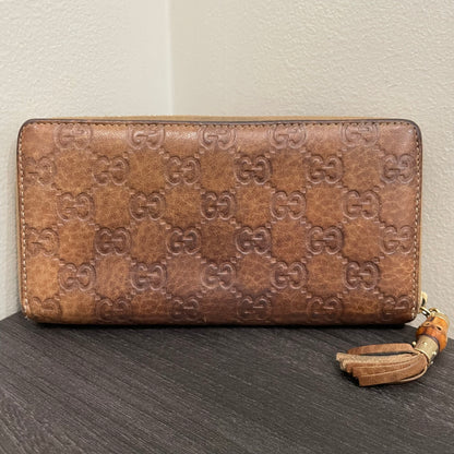 #130 GUCCI GG Leather Zippy Wallet with Bamboo Accent