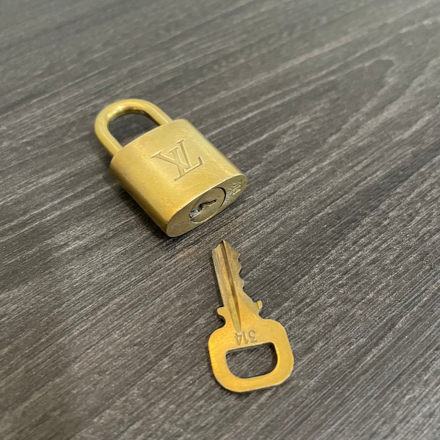 SOLD! Louis Vuitton Lock & Key