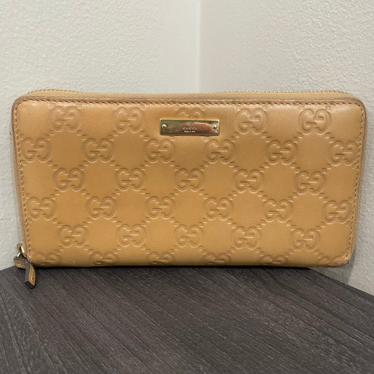 #168 GUCCI Nude GG Leather Zippy Wallet