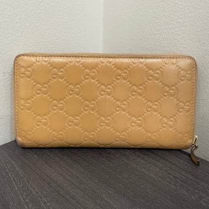 #168 GUCCI Nude GG Leather Zippy Wallet
