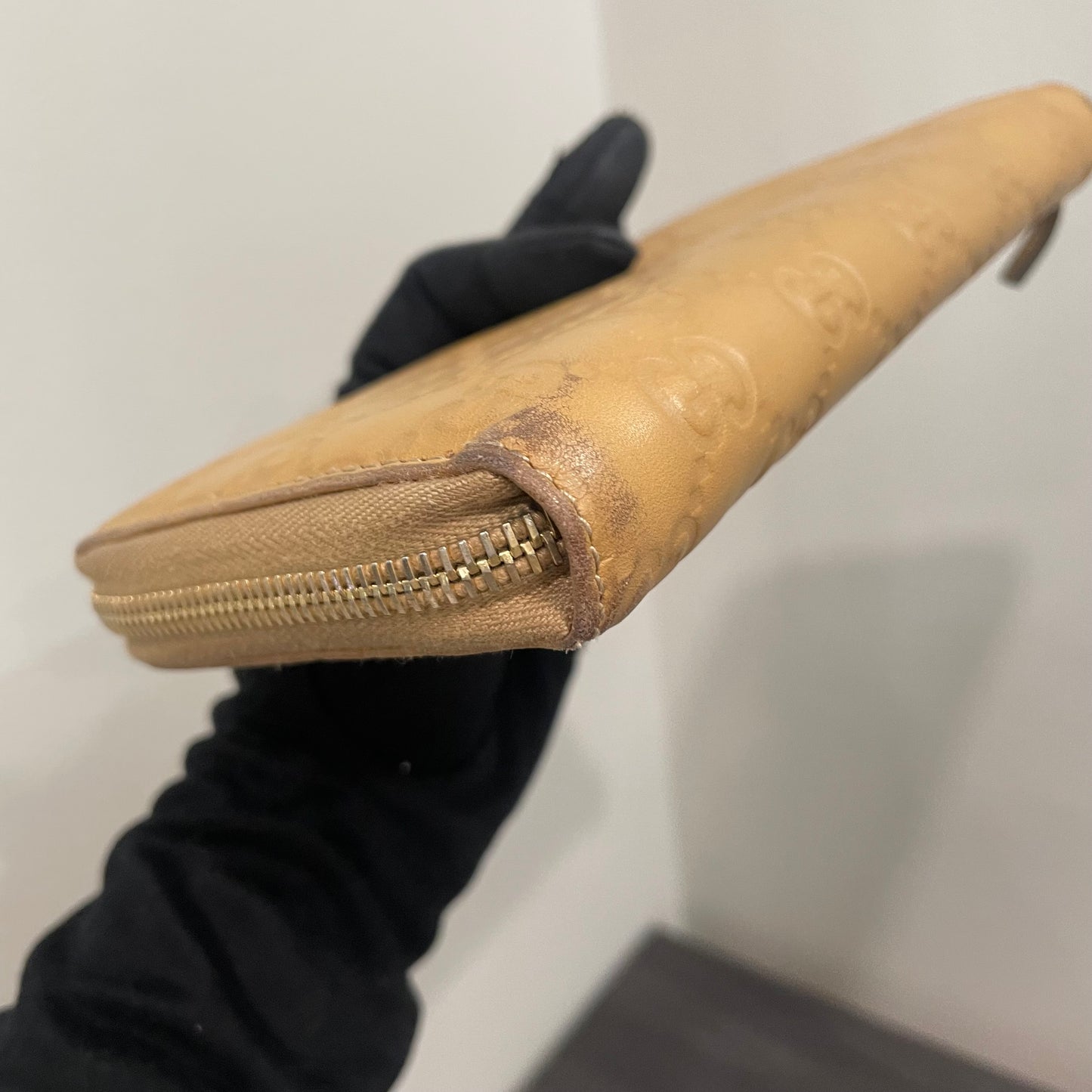 #168 GUCCI Nude GG Leather Zippy Wallet