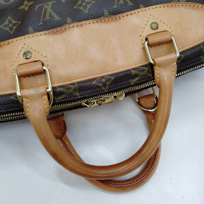 #1708 LOUIS VUITTON Monogram Alize Travel Bag